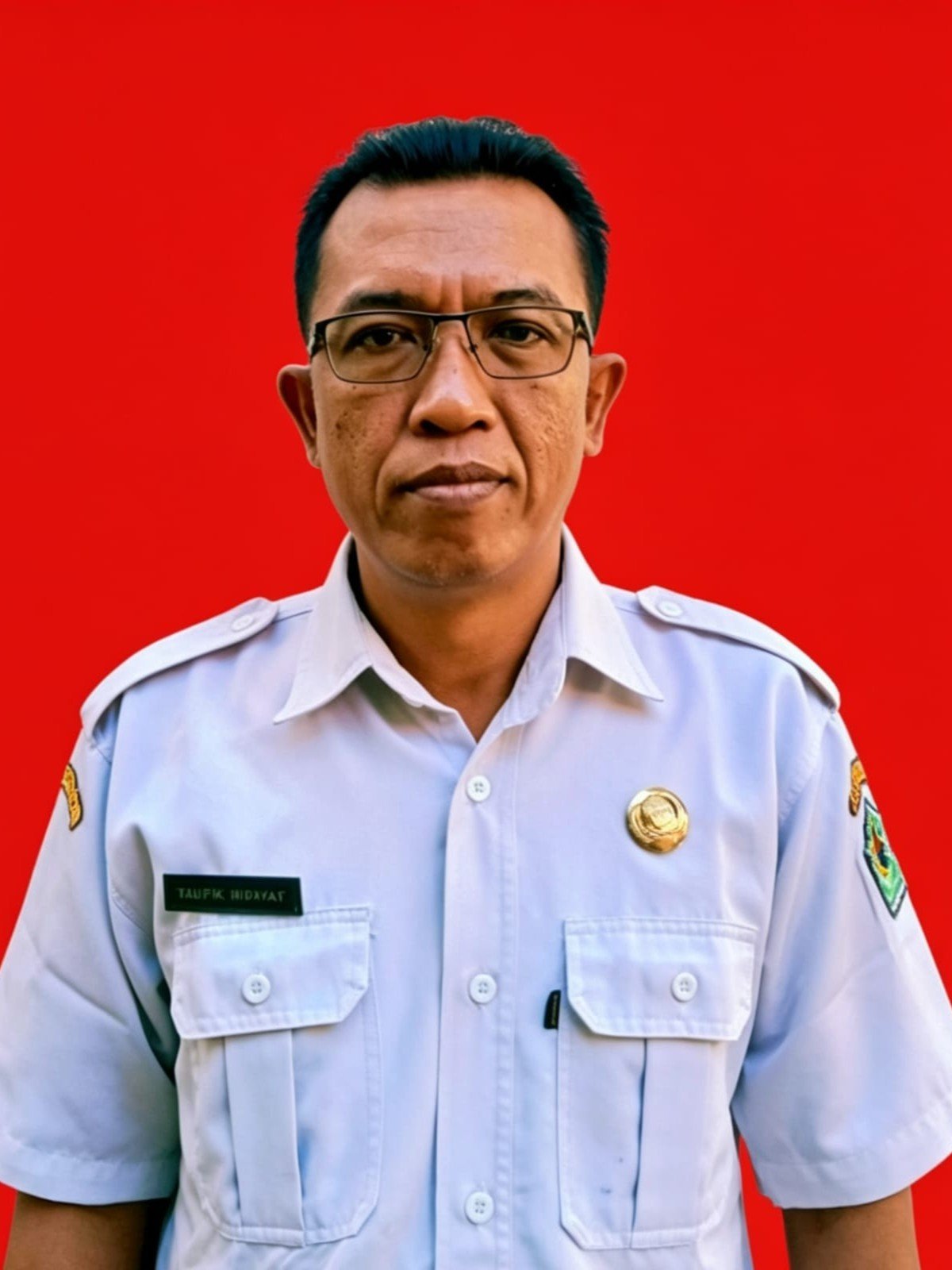 Taufik Hidayat, S.Pd